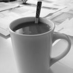 image of a cup and plans