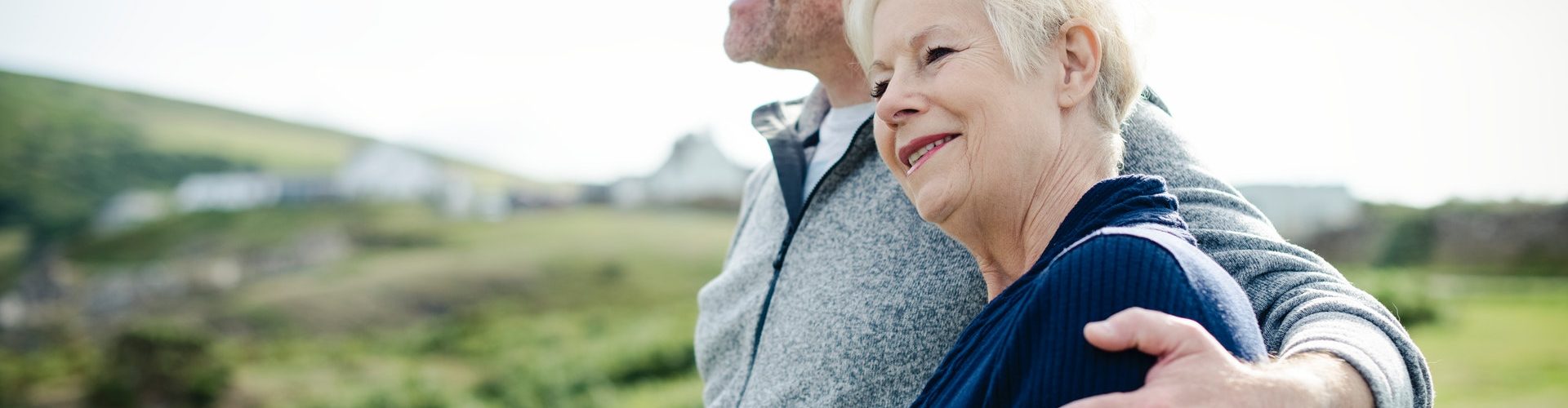 adults-arms-around-couple-1586481