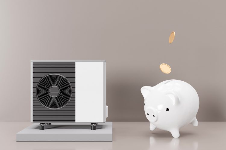 Picture of a white air source heat pump with a white piggy bank that has money being put in